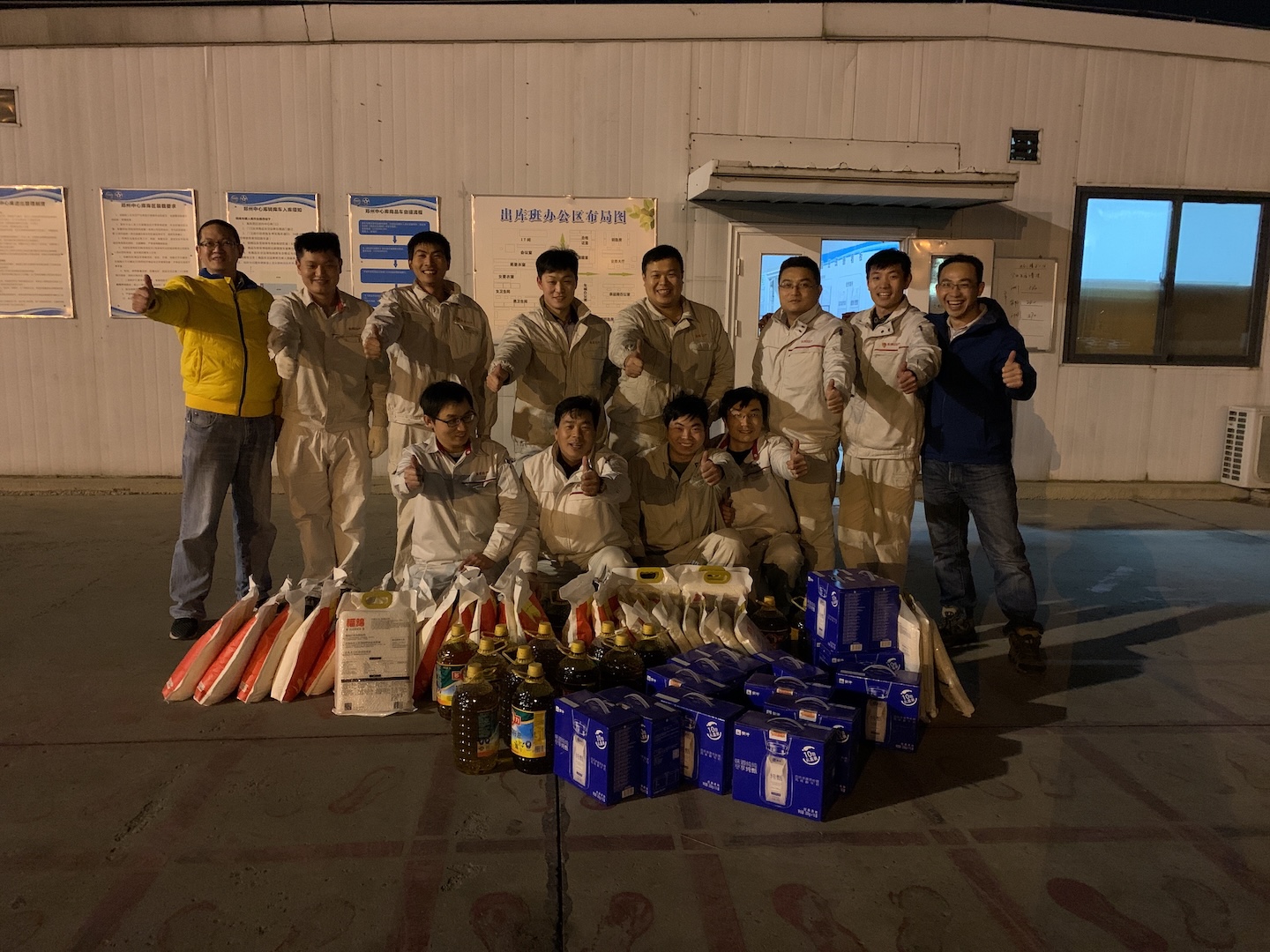 Night-time group photo of the project execution team